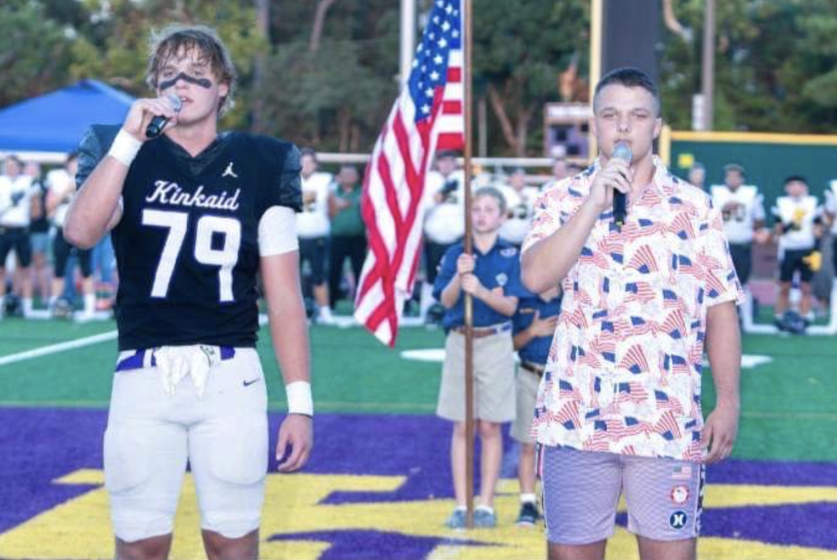 Skubisz and Huber perform at the Senior Night football game. “I was nervous, but just let those nerves fuel me and give me the power to sing my heart out,” Skubisz said. 